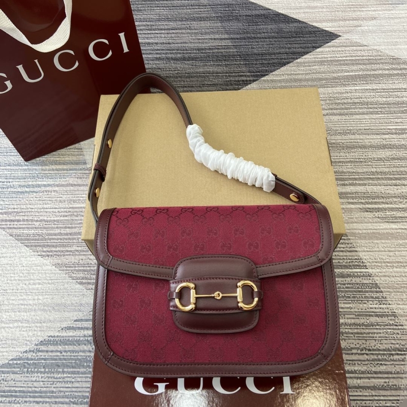 G*u*i top handle bags